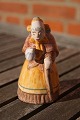 Hjorth Danish ceramics figurine, old wife with pitcher and stick in suit