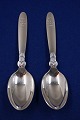 Cactus Georg Jensen Danish sterling silver 
flatware, pair of dessert spoons 17cms with 
decoration at the top of the handle