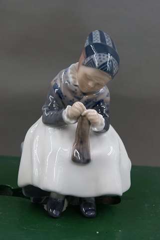 Royal Copemhagen porcelain figurine No 1314, Amager girl knitting. 