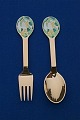 Michelsen Set Christmas spoon and fork 1980 of 
Danish gilt sterling silver