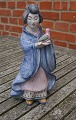 Hjorth Danish stoneware figurine No 531 in blue glaze. Japanese woman carries a bird and the left foot is glued.