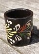 Swedish ceramics, set of 4 small mugs 6cm with black glaze and with decoration.